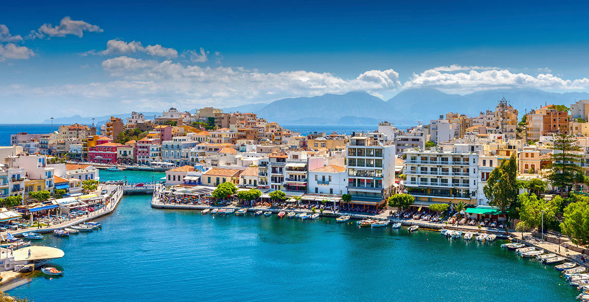 Skyline with boats docked in Crete.