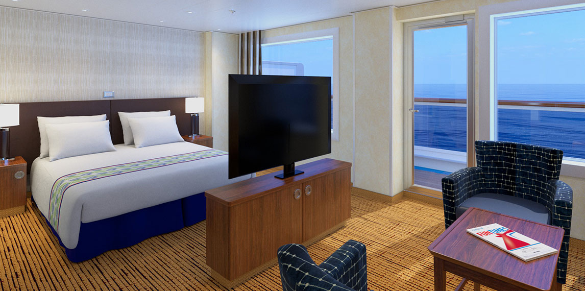 Large spacious grand suite interior with ocean view.