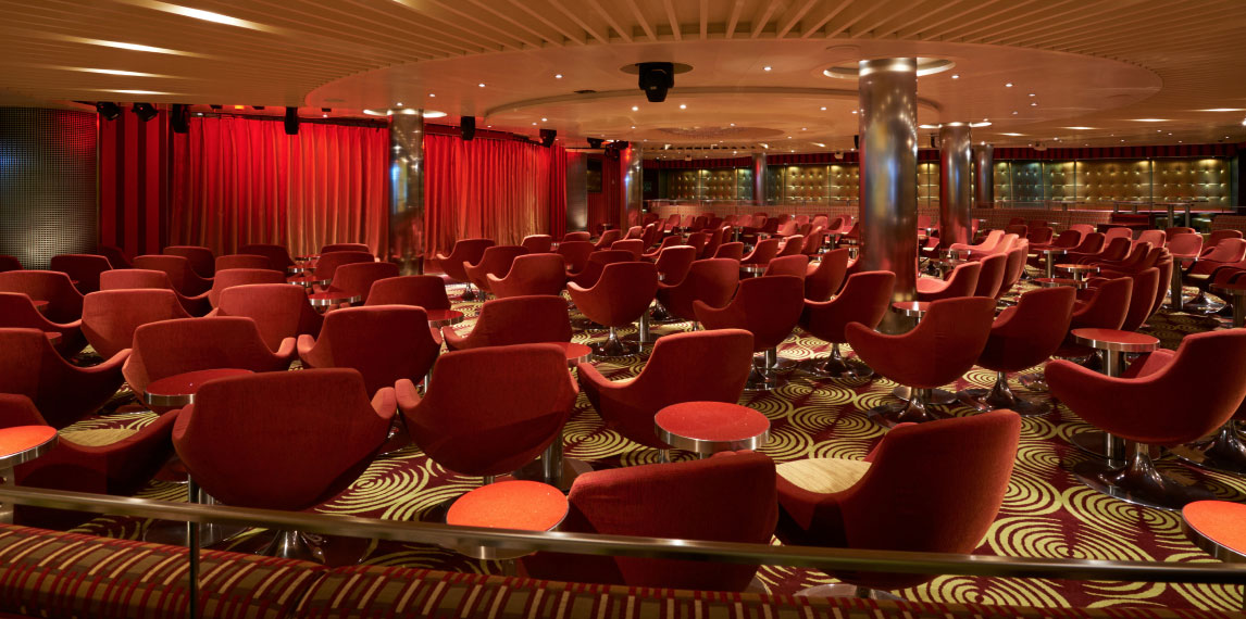 Limelight auditorium with lounge seats and stage.