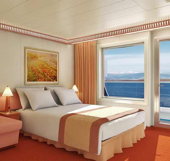 Premium balcony view stateroom interior on Carnival Liberty.