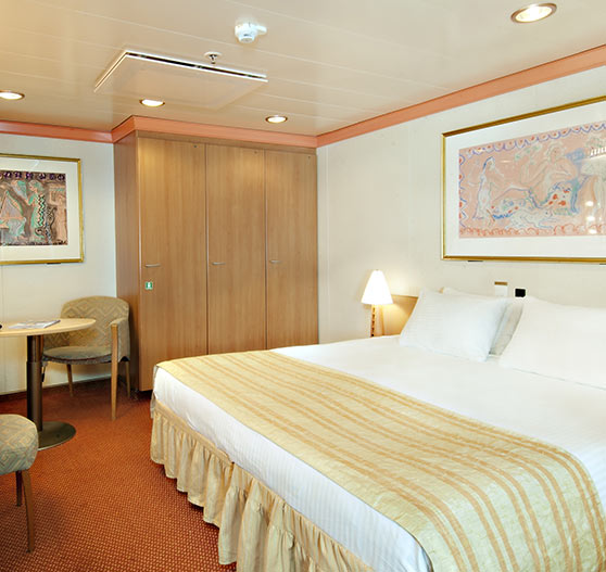 Interior stateroom on Carnival Pride.