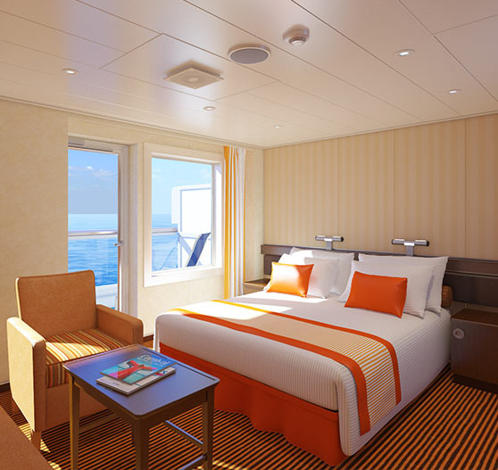 Ocean suite stateroom interior on Carnival Radiance.