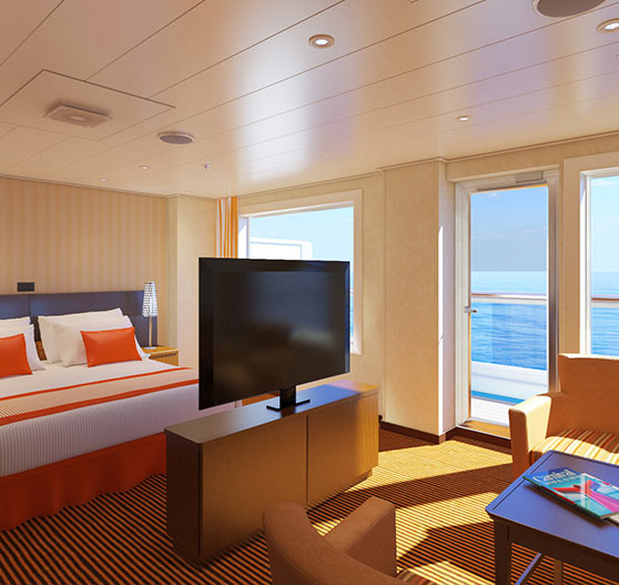 Grand suite stateroom interior on Carnival Radiance.