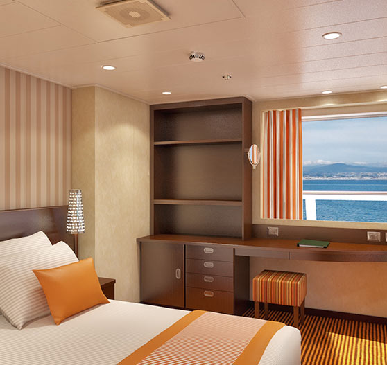 Captain suite stateroom interior on carnival valor.