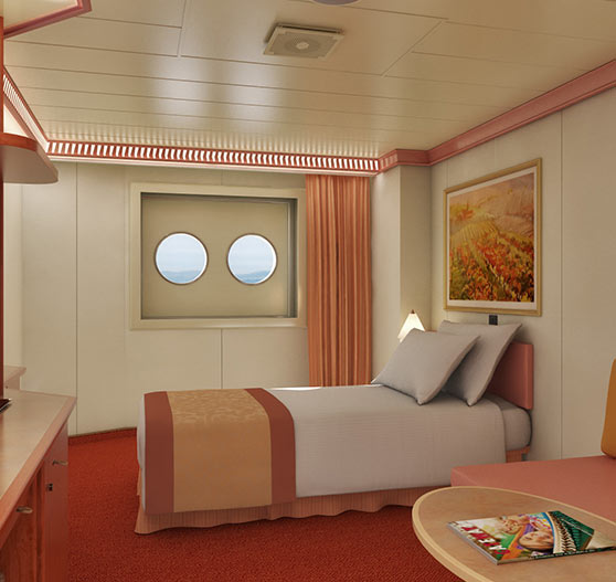 Porthole stateroom interior on carnival valor.