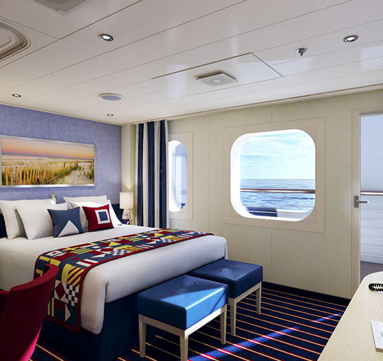 Family harbor suite stateroom interior on carnival vista.