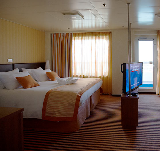 Interior of grand suite stateroom on Carnival Breeze.