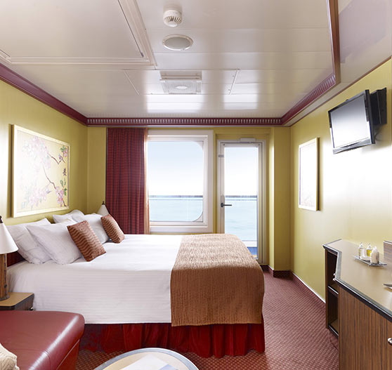 Interior of balcony stateroom on Carnival Dream.