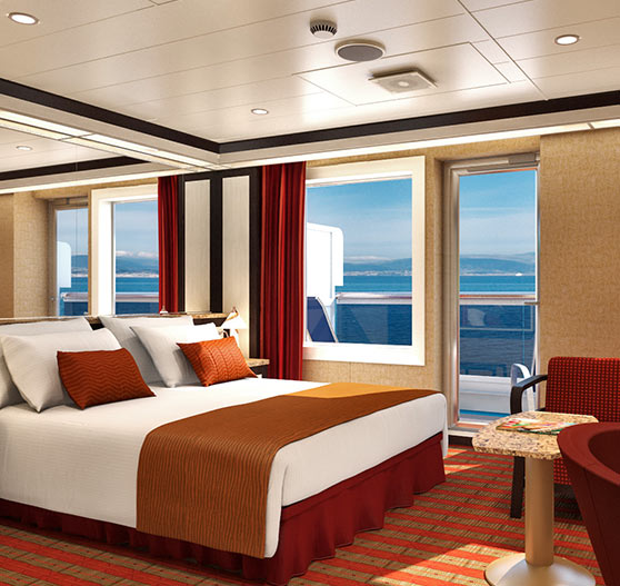 Interior of Cloud 9 suite stateroom on Carnival Dream.