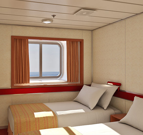 Interior of aft extended balcony stateroom on Carnival Ecstasy.