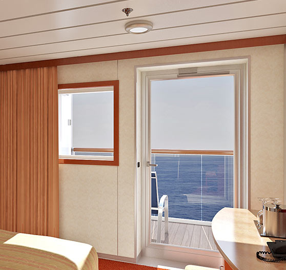 Interior of balcony view stateroom on Carnival Ecstasy.