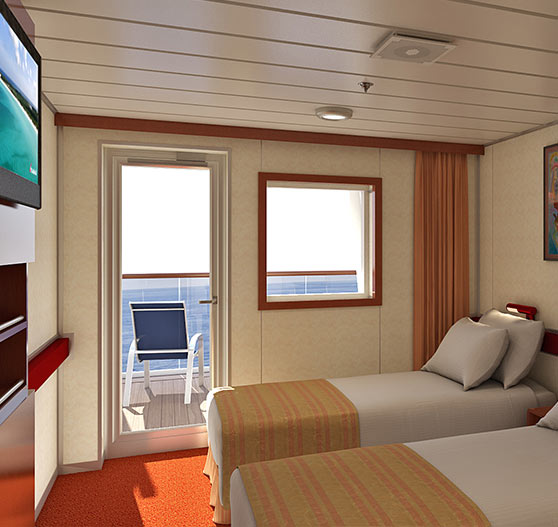 Interior of aft extended balcony stateroom on Carnival Ecstasy.