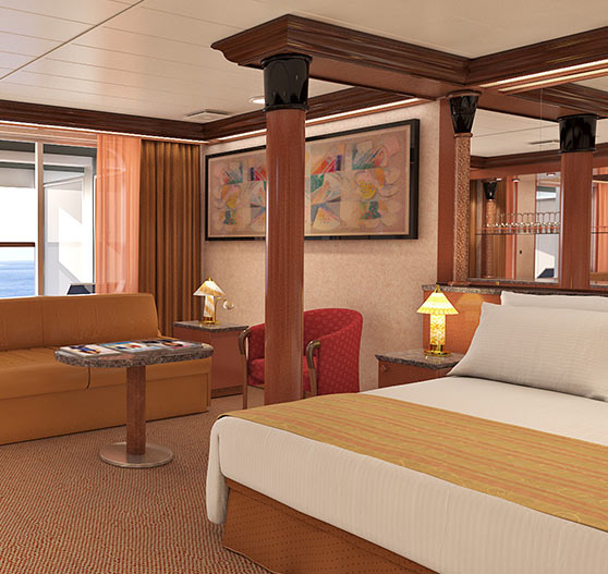 Interior of extended balcony grand suite stateroom on Carnival Ecstasy.