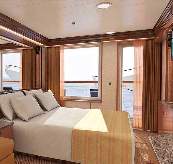 Interior of junior suite stateroom on Carnival Ecstasy.