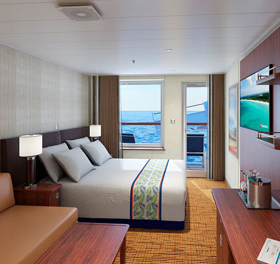 Interior of junior suite stateroom on carnival elation.