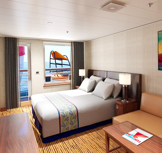 Interior of junior suite stateroom on carnival elation.